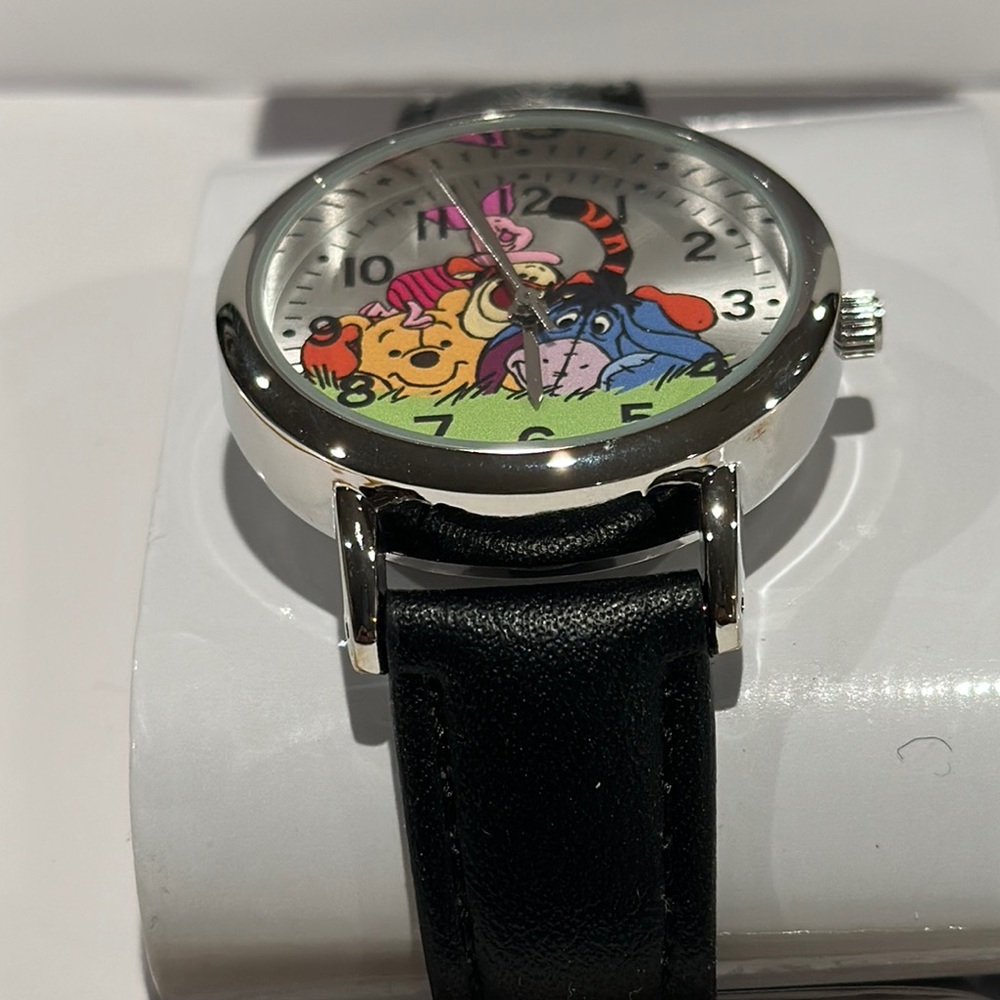 Disney Winnie the Pooh & Friends Silvertone Face Wrist Watch with Black Band.